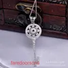 Collana con ciondolo Tifannissm La migliore vendita Regalo di Natale per compleanno e Corea del Sud ciondolo chiave classico per famiglia t girasole rotondo petalo fu