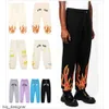 Designer Pants Mężczyzn Kolor plażowy Joggery spodnie dresowe kargos graffiti drespant jogger pantalon High Street Hip Hop pary sznurka a1'gg''gfn555