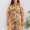 Tute da donna Set di abbigliamento da donna Abbigliamento da spiaggia estivo in due pezzi Camicia casual e pantaloncini con stampa floreale Abiti da vacanza hawaiani