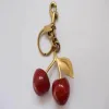 Cherry Charm Luxury Parts Accessories Handväska Pendant Nyckelring Kvinnors utsökta Crystal Cherry-biltillbehör Högklassig hänge