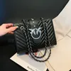 Commercio all'ingrosso borse a tracolla da donna 2 colori semplice Joker borsa in pelle tinta unita strada popolare borsa a catena con rivetti design di nicchia zaino a righe da cucire 1452 #