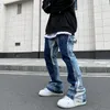 Vintage nödställda stänk av bläck flare jeans herr streetwear lapptäcke hip hop graffiti tung tvätt blå smal fit denim byxor män 240102