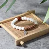 Strand OAIITE 8mm véritable porcelaine naturelle bracelet en pierre blanche pour hommes femmes tibétain argent coquille pendentif Bodhi Yoga méditation