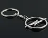 5PCSLOT Fashion Metal 3D Car Logo KeyChain Key Chain Keyring Key Ring Chaveiro Llavero för Opel Auto Pendant Car Accessories Whol2947649