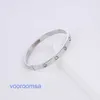 Pulsera de edición de alta calidad Llantas de automóvil de lujo ligeras Acero de titanio Tarjeta de diez diamantes Hogar Oro rosa de 18 quilates Moda Estrella del cielo completa Conjunto de acero inoxidable con caja original