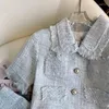 Arbeitskleider Duftende blaue Kurzarm-Strickjacke mit Quastenjacke Crop Tweed 2024 Sommerröcke Anzüge für Frauen 2 Sätze