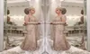 2018 Luxury Mother of the Bride Dresses V Neck långa ärmar kristallpärlade sjöjungfrun spetssapplikation plus size party kväll bröllop g8706576