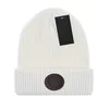 2023 Diseñador de invierno Gorro de punto Gorro de lana Mujeres Tejer Gorros cálidos gruesos Sombreros Gorro femenino 17 colores a10