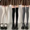 Chaussettes chaudes et hautes pour femmes, 1 paire, Y2k, Lolita, en coton, au-dessus du genou, à la mode, couleur unie, rayures verticales, Tube Long