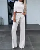 Kvinnors tvåbitar byxor Spring Crop Top med flare Set Women Fashion Solid Turtleneck T Shirt Suit Office Casual White Pant Lady