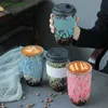 Largecapacity Ceramic Coffee Mug with Silicone Lid Europeanstyle Insulation Cover Cup Tea Latte Handy Water 240102