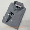 Camicie casual da uomo Camicia firmata Camicia da uomo ampia Camicia da lavoro a maniche lunghe ricamata tinta unita Camicia da lavoro di colore normale a più colori Camicetta stile americano T222