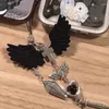 Porte-clés à la mode pendentif de téléphone injecteur charme chaîne sombre matériau en alliage cadeau parfait pour les femmes