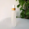 Bottiglie di stoccaggio 70 pezzi / lotto Bottiglia di vetro smerigliato trasparente da 150 ml con coperchio in bambù Confezione cosmetica ecologica