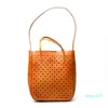 Vegetable tanned simple versatile casual commuting women's leather hollowed out tote bag with one shoulder