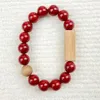 Strand Mysore District oude sandelhout armband met vermiljoen rood natuurlijk minimalistisch ontwerp gevoel handgemaakt meisje