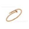 Designer Cartres Bangle Hot verkopen eenvoudige en gepersonaliseerde mannen dames mode nagelarmband kruising 18k goud openingspaar 1ukg