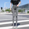 Jeans da donna elasticizzati a vita alta pantaloni in denim a margherita piccola ricami all-match skinny streetwear pantaloni femminili casual oversize