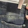 Jeans da uomo firmati firmati 2023 jeans da uomo Autunno / Inverno Nuovo marchio di moda europeo semplice di alto lusso Elastico Slim Fit Piccoli piedi Pantaloni in denim di puro cotone top 2SM