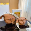 Evening Bag Designer Crossbody Bag Women's Designer High Quality Leather Saddle Bag Bow Bow Jigsaw Bag Love Shoulder Bag Adjustable Crossbody bag Geometry Bag 2 sizes