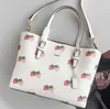 Femmes Sac à main Mollie Sac fourre-tout Totes CBAG Designers Sac Femmes Fraise Shopping Sacs Luxurys Sac à main en cuir Sacs à bandoulière Sacs à bagages Portefeuille