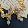 Oorknopjes Qingdao Vintage Mid-Ancient Kwastje Parel Licht Luxe Strass Geometrisch Verguld Mode Standaard Oorclip