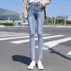 Jeans da donna elasticizzati a vita alta pantaloni in denim a margherita piccola ricami all-match skinny streetwear pantaloni femminili casual oversize