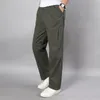 Erkek pantolon yaz erkek haki büyük boyutlu düz uyum büyük boyutları 5xl yan cep geniş bacak pamuklu siyah kargo iş pantolonlar erkek