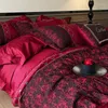 Set di biancheria da letto Set di quattro pezzi per matrimonio lungo in cotone Lenzuolo e forniture per trapunta rossa pura. Biancheria da letto