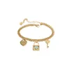 Luxrry marque 18k or Cassic T lettre bleu goutte huile serrure clé Double couche Bracelet pour les femmes