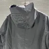 Veste hardshell à capuche imperméable et imperméable de styliste pour l'extérieur, épaulettes brodées pour hommes et femmes