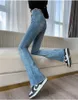 Jeans Pantaloni svasati skinny da donna Jeans con taglio vivo alla moda Jeans slim retrò blu coreani alla moda a vita alta elasticizzati in denim lavato Boutique