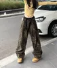 Jeans leopardati casual larghi e larghi di alta strada, design femminile di nicchia autunnale, pantaloni a gamba larga dritti e selvaggi a vita alta.