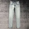 Märke denim mäns designer jeans mäns amerikanska vintage rippade jeans mäns vanliga jeans smala smala byxor mode alla matchande gyllene lapp trendbyxor z6