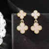 Boucles d'oreilles trèfle à quatre feuilles en acier titane pour femmes, boucles d'oreilles à pampilles simples à la mode et élégantes, cadeau de saint valentin