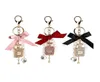 Keychains Fashion Imitation Pearl Perfume Bottle Keychain Car Key Ring Holder Bag Charm Pendant Accessories Bow KeyFob Women Keyri8739607