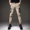 chegam calças cargo leves de luxo masculinas ao ar livre calças táticas esportivas calças com bolsos camuflados da moda calças jeans casuais slim-fit; 240103