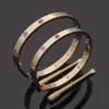 Ny ankomst läder armband klassisk design mode kvinnor armbangles guld silver rose titanium stål armband par smycken grossist304j