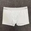 Boxer large élastique pour hommes, sous-vêtements avec impression de lettres, pochette 3D, short en coton de couleur unie