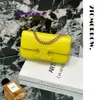 Borse tote di design di lusso Negozio online di Celins Nuovissimo reso e cambio per un periodo limitato versione con chiusura in pelle Triump giallo limone con logo reale