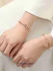 Designer Bangle Car Tiress för kvinnor och män avancerade smycken 18K Guld Nail dubbel T Armband Halsband Ring Fem blommaörhängen har originallåda