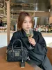 Designer Bag Miui Läder veckad handväska avancerad liten fyrkantig väska bowlingboll singel axel crossbody kvinnors väska