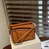 مصمم حقائب Loewelly 2024 Autumn/Winter Puzzle Geometry Bag Bag Single Handheld Crossbody Melade Fashion Bag