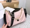 Bolsos de hombro tipo cubeta de nailon para mujer, bandolera con cadena, monederos con letras de Metal, bolsos de mensajero para mujer, moda de diseñador