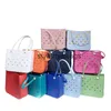 Bolsas de playa bolsa de playa impermeable suave EVA organizador perforado verano agua parque mar bolsos de mano Stockstylishyslbags de mujer