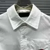 Camisa infantil de lujo ropa de bebé Tamaño 100-160 CM ropa de diseñador para niños Logotipo bordado decoración de bolsillo niñas niños Blusas Dec20