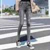 Jeans da donna elasticizzati a vita alta pantaloni in denim a margherita piccola ricami all-match skinny streetwear pantaloni femminili casual oversize