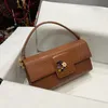 Sac féminin classique à la mode célèbre sac d'épaule de créateur couleur couleur sexy européen et américain sac à main le sac de fête sac en métal sac de chaîne métallique