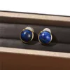 Mode française incrustée de pierre d'or bleu motif pierre oeil de tigre boucles d'oreilles en pierre pour les femmes lumière luxe de haute qualité haut charme bijoux tendance