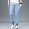 Jeans da uomo in cotone elasticizzato a vita alta dritti 2024 Primavera Estate Business Casual pantaloni in denim larghi maschili pantaloni slim di marca di fascia alta